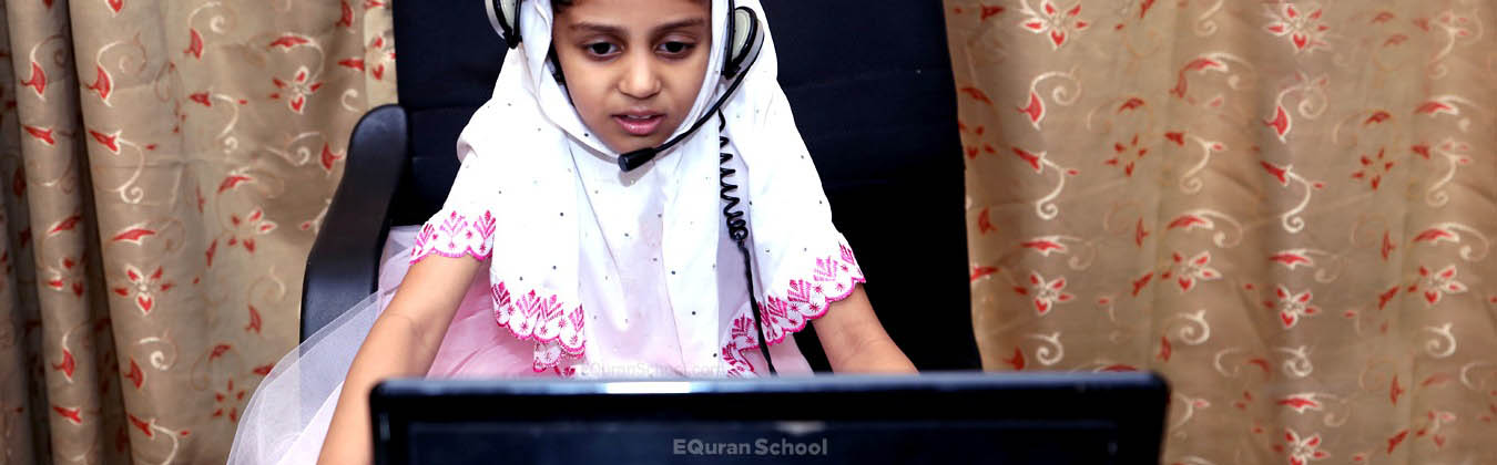 Young Muslim girl engaged in Noorani Qaida lesson