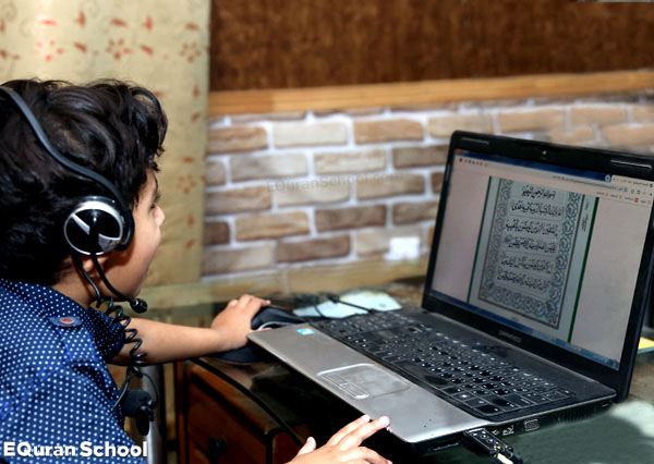 Young Muslim child engaged in online Quran lesson